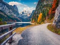 Beautiful autumn scenery. Spectacular morning scene of Vorderer Gosausee lake with Dachstein glacieron background. Royalty Free Stock Photo