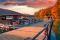 Splendid evening view of pure water lake with boats in Plitvice National Park. Royalty Free Stock Photo