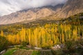 Beautiful autumn season in Hunza valley surrounded by Karakoram mountains range, Gilgit Baltistan north Pakistan Royalty Free Stock Photo