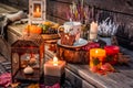 Beautiful autumn terrace decoration with pumpkins, lantern, plants and flowers