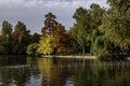 Beautiful autumn trees and colors reflection by the lake in the park scenery