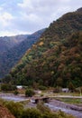 Beautiful autumn view of hills covered with forest in Pshavi Royalty Free Stock Photo