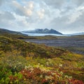 Beautiful autumn view from Mulagljufur Canyon to Fjallsarlon glacier with Breidarlon ice lagoon, Iceland. Not far from Ring Road