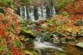 Autumn waterfall on mountain stream in Janske Lazne in Czech republic Royalty Free Stock Photo