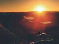 Beautiful awakening in rocks. Sleeping in nature in sleeping bag. View from rocky peak