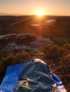 Beautiful awakening in rocks. Sleeping in nature in sleeping bag. View from rocky peak