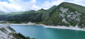 a beautiful azure lake among beautiful mountains Royalty Free Stock Photo