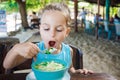 Baby boy is eating soup in Thailand Royalty Free Stock Photo