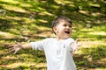 Beautiful baby boy one-year-old crawling, smiles and laughs Royalty Free Stock Photo