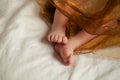 Beautiful baby feet on white background. Newborn baby girl closeup Royalty Free Stock Photo