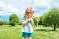 Beautiful baby Girl blowing soap bubbles in the city park Ureki. Ecology and Nature outdoors. Hot sunny summer. happy childhood, Royalty Free Stock Photo