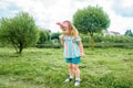 Beautiful baby Girl blowing soap bubbles in the city park Ureki. Ecology and Nature outdoors. Hot sunny summer. happy childhood, Royalty Free Stock Photo