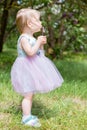 Cute Baby Girl with Bubbles in the Park. Summer Concept Royalty Free Stock Photo