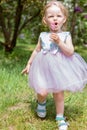 Cute Baby Girl with Bubbles in the Park. Summer Concept Royalty Free Stock Photo