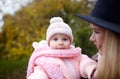 Beautiful baby girl with mother outdoors. Family outdoor Royalty Free Stock Photo