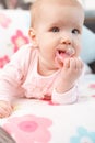 Beautiful baby girl playing with dummy Royalty Free Stock Photo