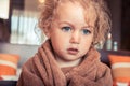 Beautiful baby girl wrapped in bath towel Royalty Free Stock Photo