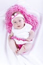 Beautiful baby with heart pink pillow