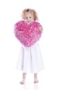 Beautiful baby with heart pink pillow Royalty Free Stock Photo