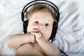 Beautiful baby listening to music