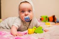 Beautiful baby with a nipple Royalty Free Stock Photo