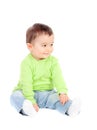 Beautiful baby sitting on the floor Royalty Free Stock Photo