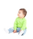 Beautiful baby sitting on the floor Royalty Free Stock Photo