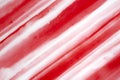 Decorative background with red and white watercolour stripe pattern.