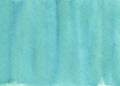 Watercolor background of teal color gradient with artistic washes.