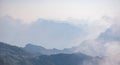 Beautiful background with blue ridge in hazy mountains. Julian Alps