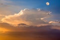Beautiful Background With Colorful Fluffy Clouds, A Flying Kite And The Rising Moon In The Sky At Dusk