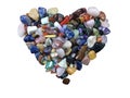 Beautiful background of colorful various gemstones made in heart