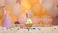 Beautiful background happy birthday number 15 with burning candles, birthday candles pink letters for a fifteen year old child.
