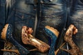 Beautiful background of jeans, jackets and shoes with crystals
