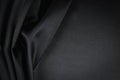 Beautiful background luxury cloth with drapery and wavy folds of black silk satin material texture. Abstract monochrome Royalty Free Stock Photo