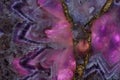 Beautiful background of natural stone amethyst purple backlit, turning the stone into pink