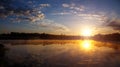 Beautiful background of nature. wonderful misty landscape. amazing foggy morning, colorful sky reflected in the water of tranquil Royalty Free Stock Photo