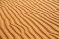 Desert sand textured patterns naturally done by wind. Royalty Free Stock Photo