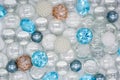 Beautiful background of transparent, light blue glass beads, crystals and white pearls. Copy space Royalty Free Stock Photo