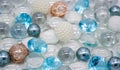 Beautiful background of transparent, light blue glass beads, crystals and white pearls. Copy space Royalty Free Stock Photo