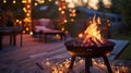 Beautiful backyard firepit at dusk with comfortable chairs Royalty Free Stock Photo