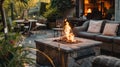 Beautiful backyard firepit at dusk with comfortable chairs Royalty Free Stock Photo