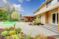 Beautiful backyard with swimming pool and patio area Royalty Free Stock Photo