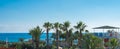 Beautiful balcony view, palms and ocean Royalty Free Stock Photo