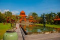 Beautiful Balinese building with a fountain and sculpture-man playing the flute. Tanjung Benoa. Nusa Dua, Bali Royalty Free Stock Photo