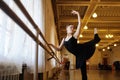Ballerina in rehearsal or training in ballet class