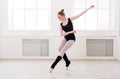 Beautiful ballerina stands in ballet assemble Royalty Free Stock Photo