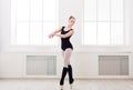 Beautiful ballerina stands in ballet pirouette