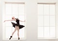 Beautiful ballerine stands in ballet position Royalty Free Stock Photo