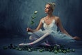Beautiful ballet dancer with a white roses.